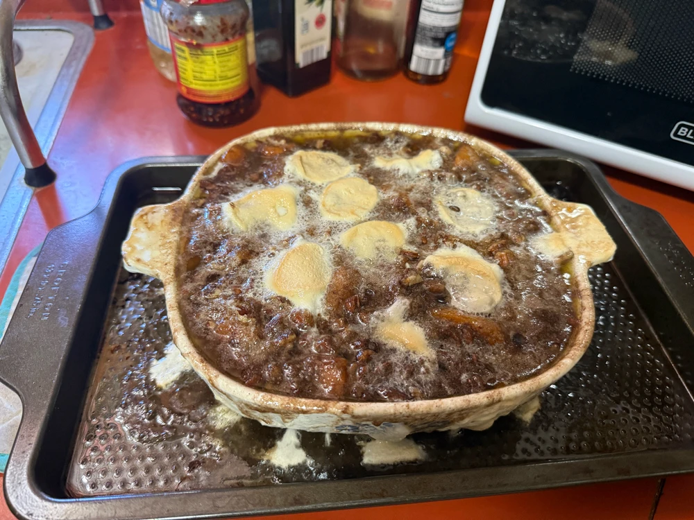 Candied yams with pecans and marshmellows. 