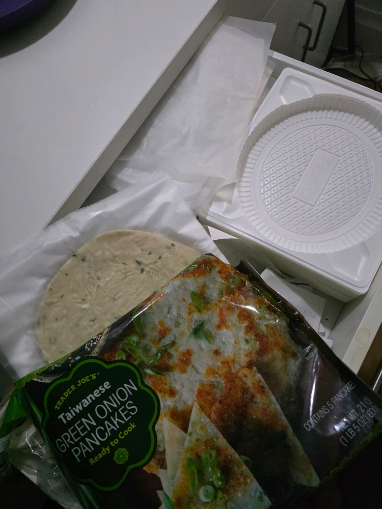 The plastic platform one can get from Trader Joe's Green Onion pancake containers is also a better disposable plate.