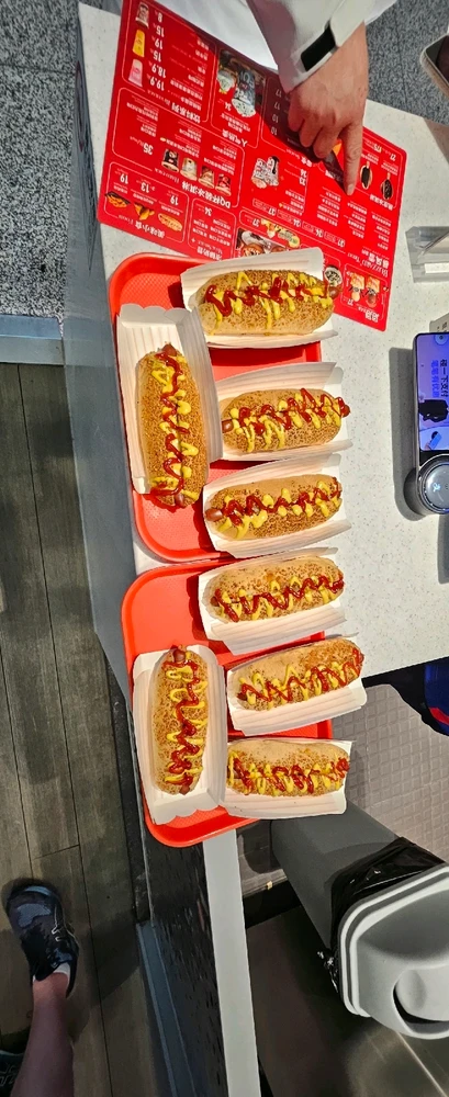 There was "American dream" hotdogs in the airport altough I don't remember where