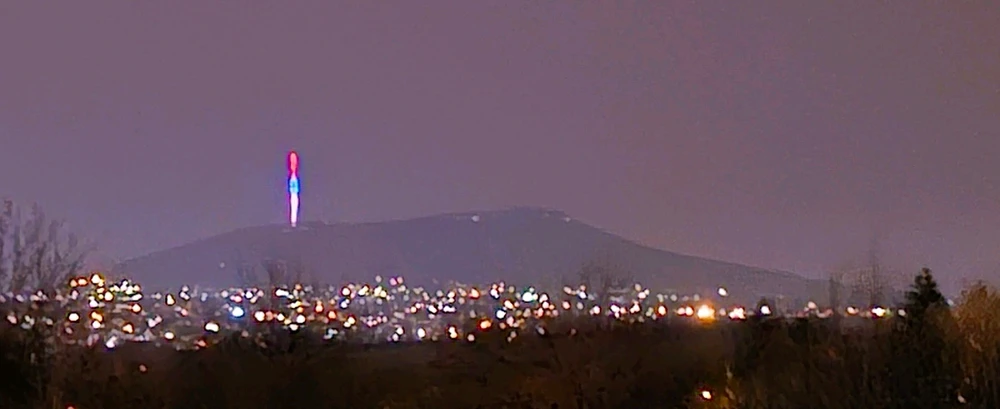 Avala mountain and tower at night, as seen from 8km/5mi away