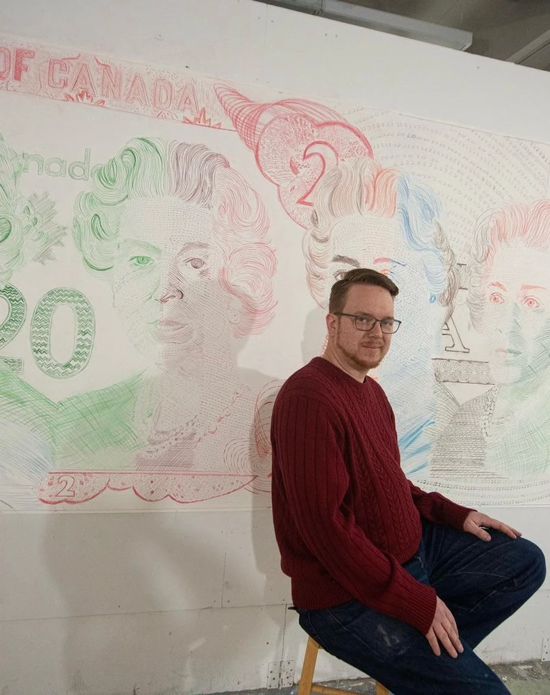 Here I am striking a pose in front of a giant coloured pencil drawing of queen Elizabeth the 2nd I did for my grad show.