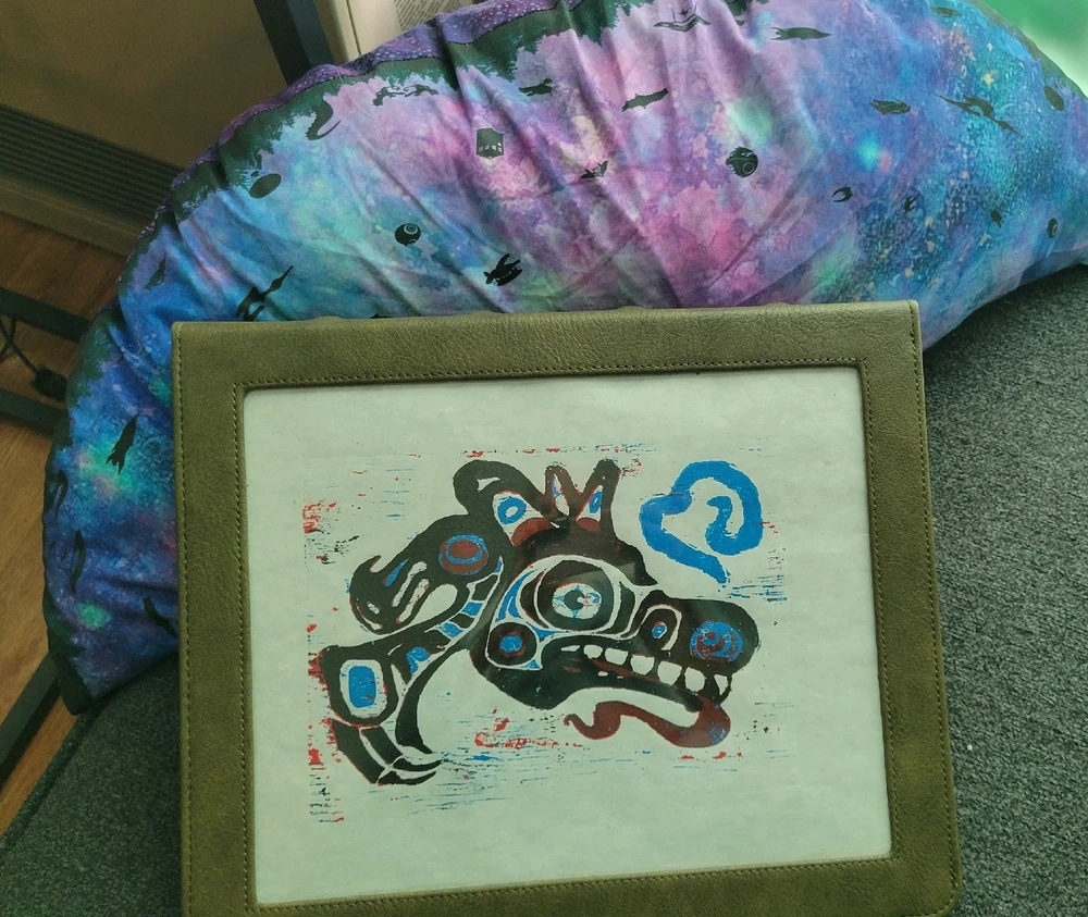 My Art on my dnd binder, and the pillow behind it.