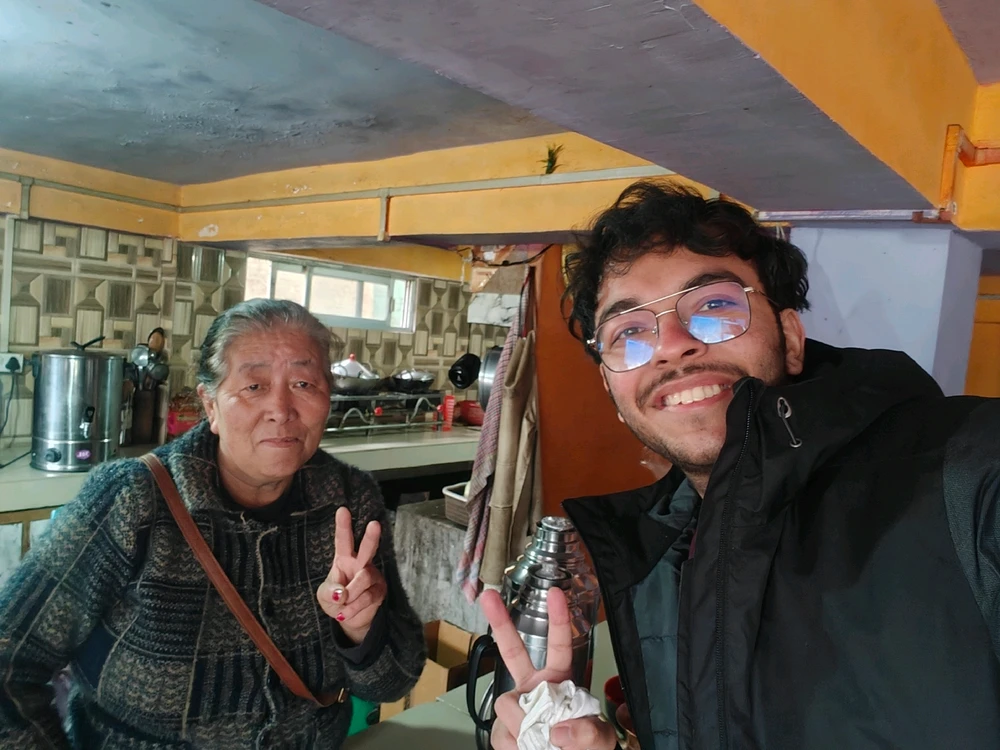 A sweet aunty at Nathula pass
We drank tea here and then the victory pose :)