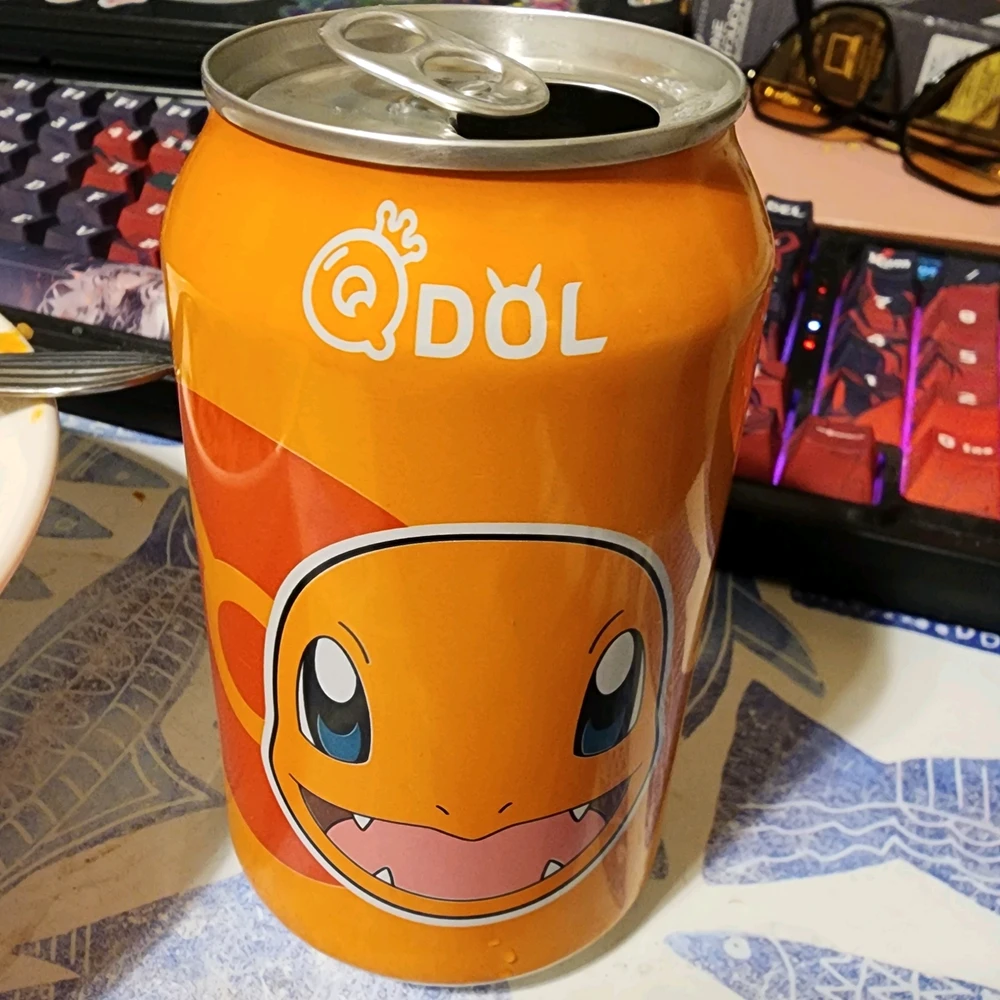 Lychee favored pop. Orange can with a Charmander face.