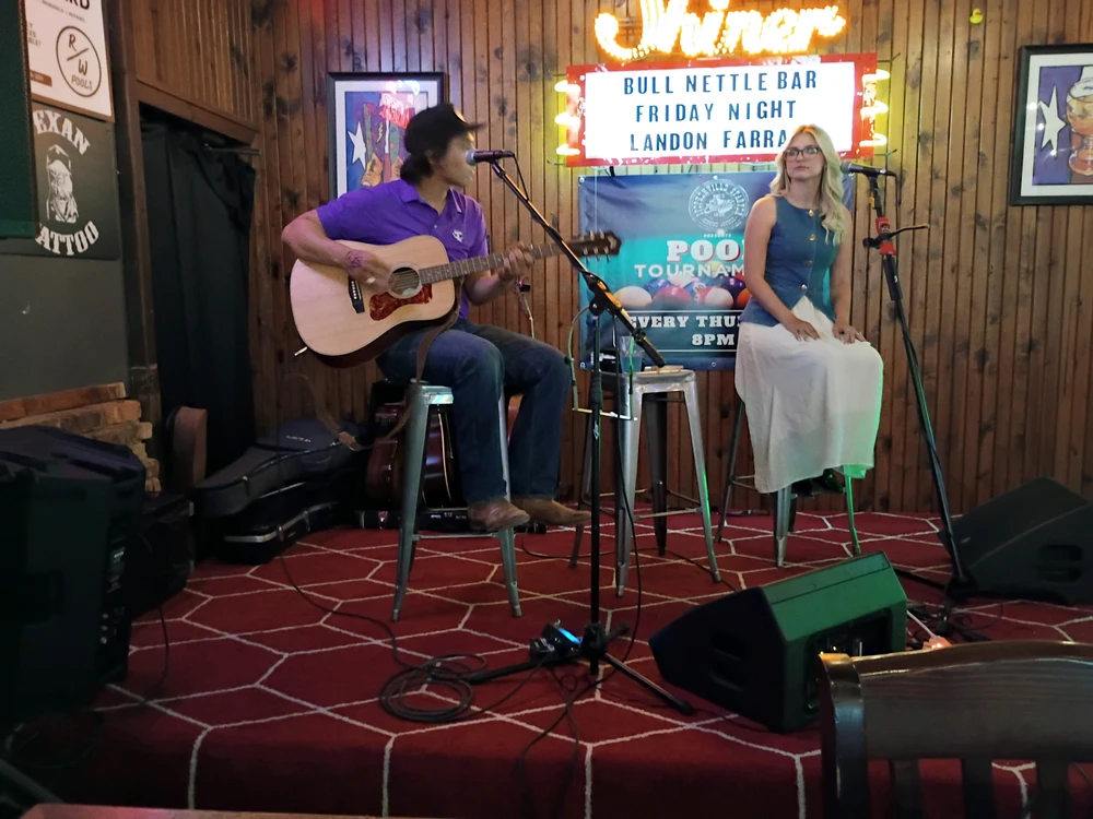 Watching these people play at an open mic. Do not have recordings of me as I have a new phone. 