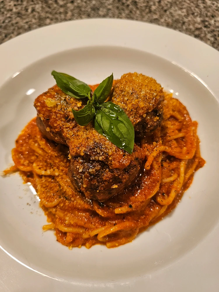 Spaghetti and Meatballs in house-made marinara