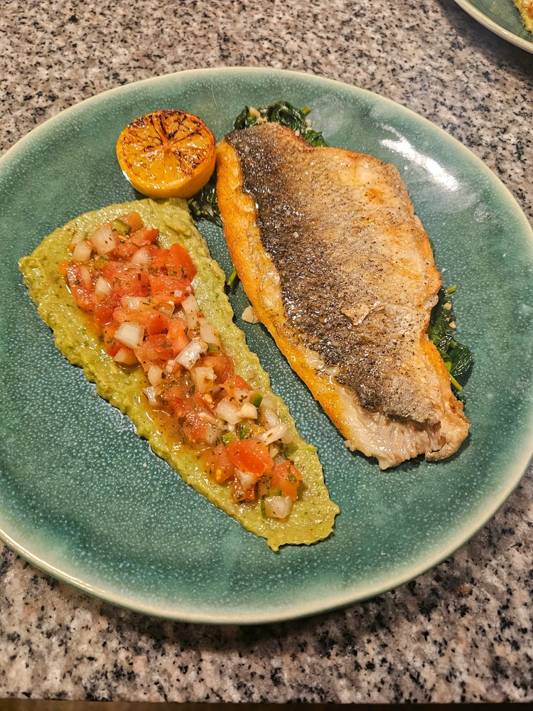 Fillet of Branzino with Guacamole, Pico de Gallo, and Wilted Spinach