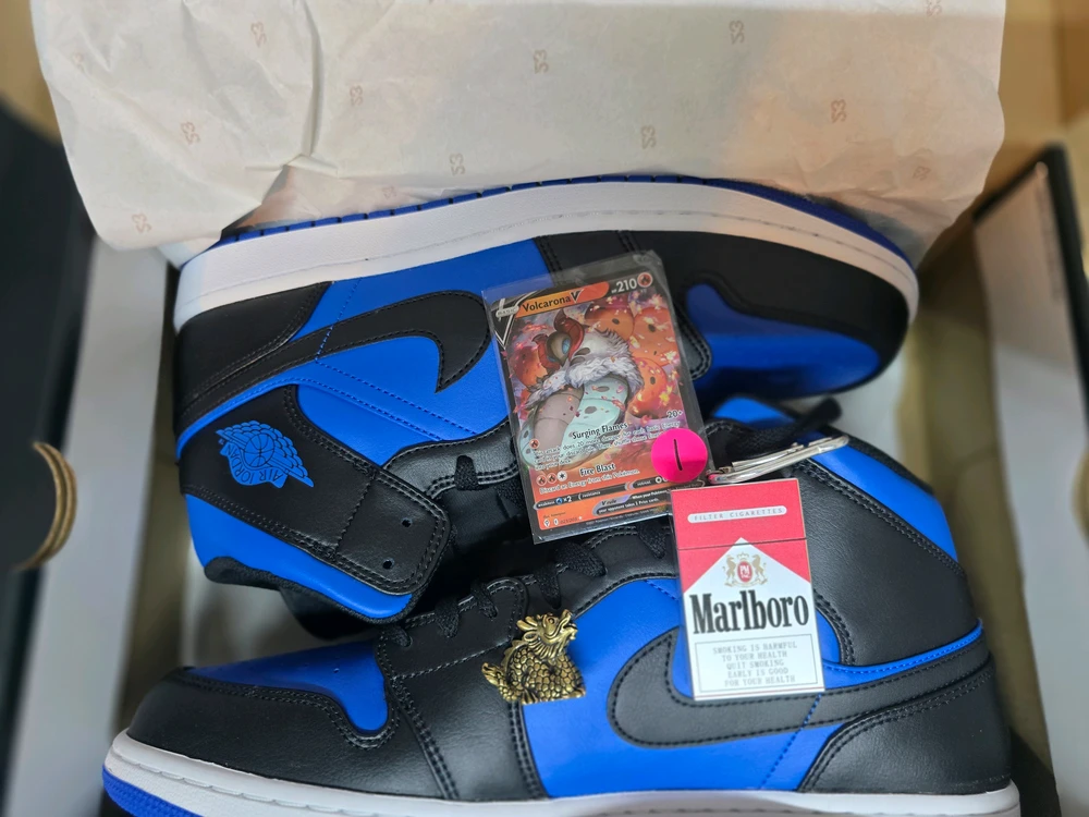 Solid Brass Dragon Figurine ($10), Marlboro Keychain ($5) Card of My All Time Favorite Pokemon (free) And the Jordan's ($60)