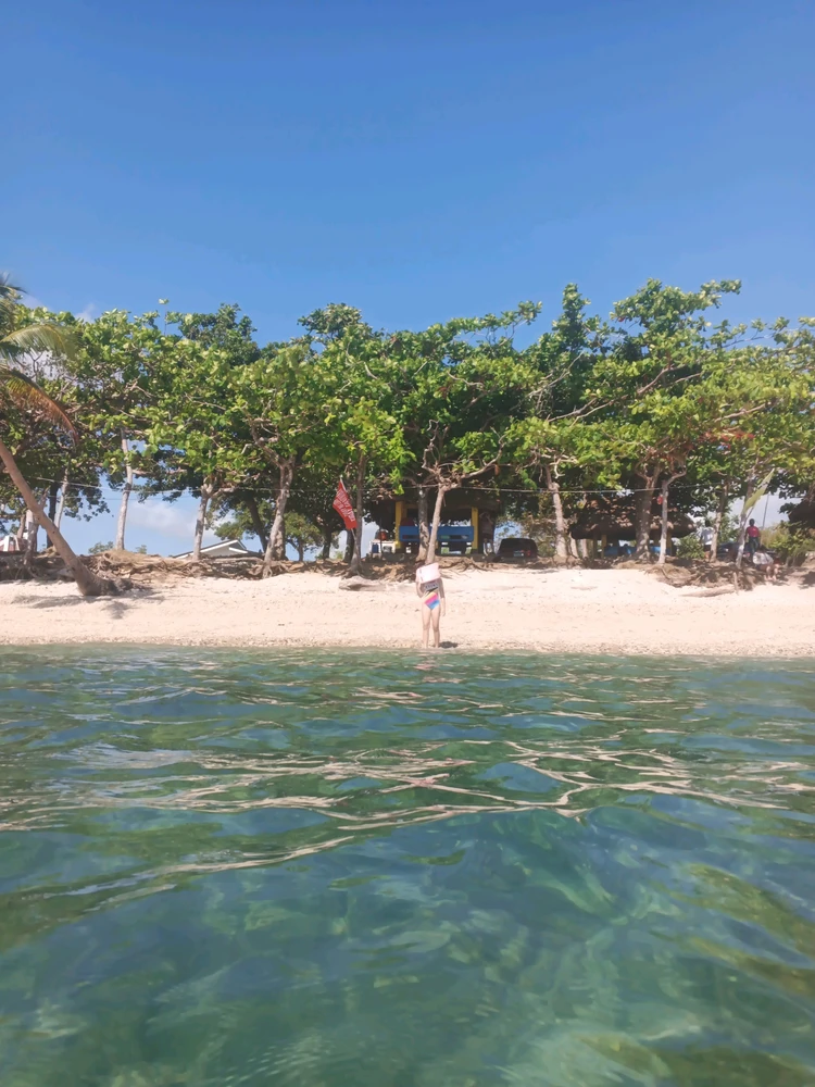 Bituon Beach. Fun fact Bituon means Star, the ocean looks like a sea of stars when sunlight reflects on the ocean.