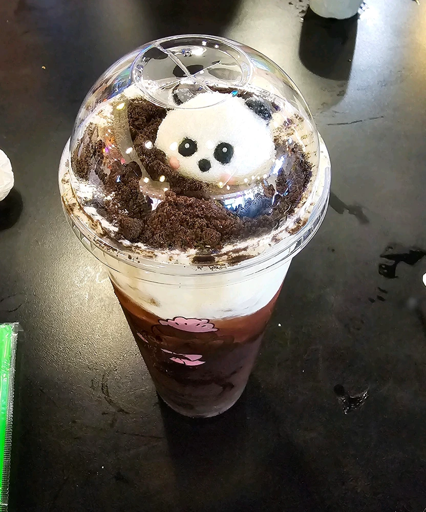 The moment before I accidentally stabbed him in the head getting the straw in.