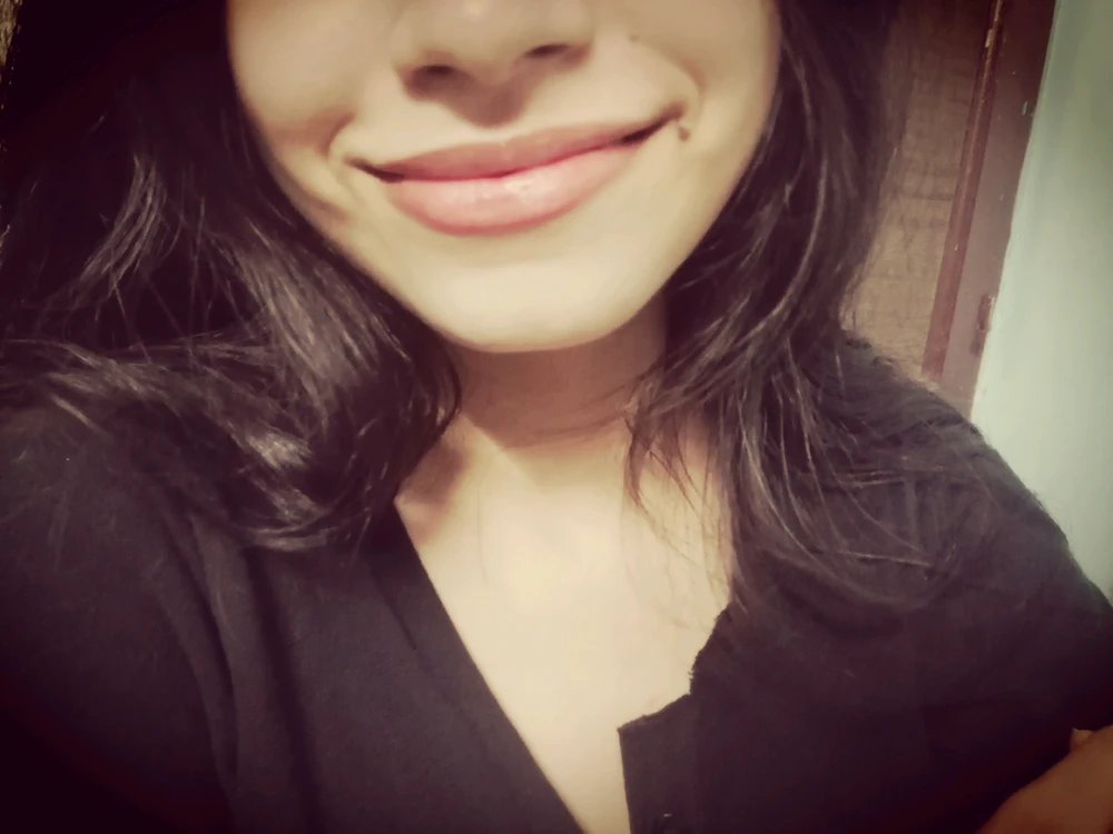 Showing off my smile and lipstick colour cause i like it 