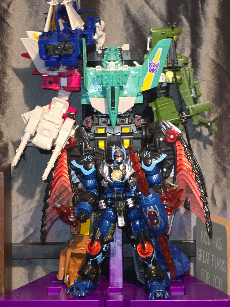 In this photo Deathsaurus is standing in front of Liokaiser in they configuration with death cobra as the left arm.