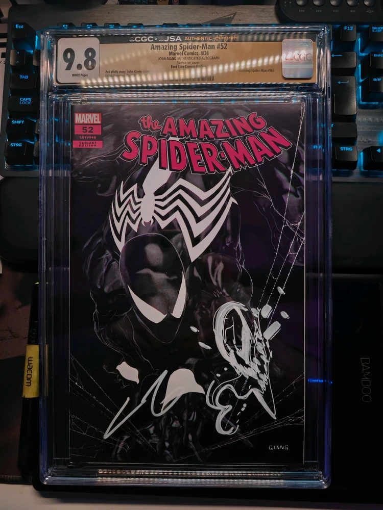 A CGC graded comic book amazing Spider-Man #52 from August 2024.reached grading 9.8. it is marked and signed by Giang